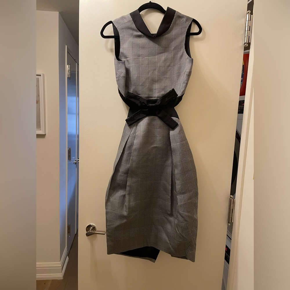 Dimmer D’vrsi Peplum Sleeveless Dress With Bow and Back Cutout 6